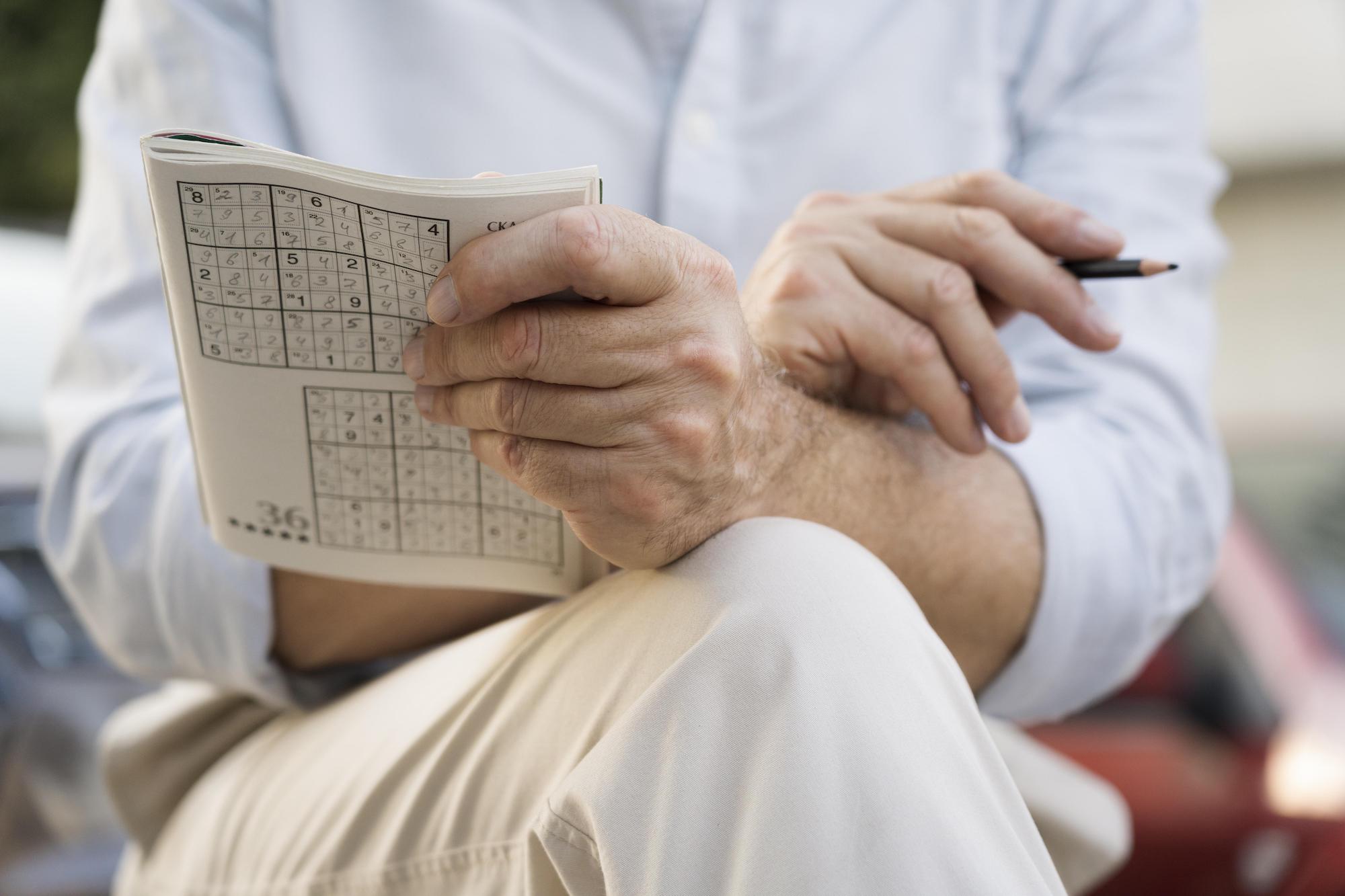 man playing sudoku on dailysudokupuzzle